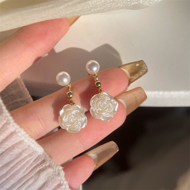 Camellia Flower Pearl Clip on earrings