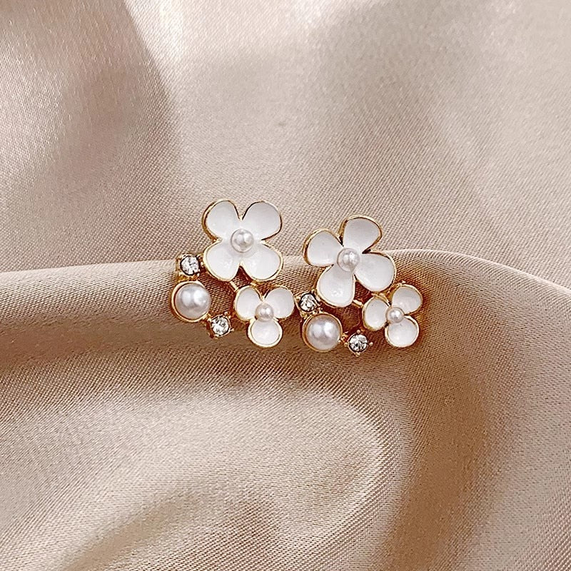 White Flower Clip on Earrings