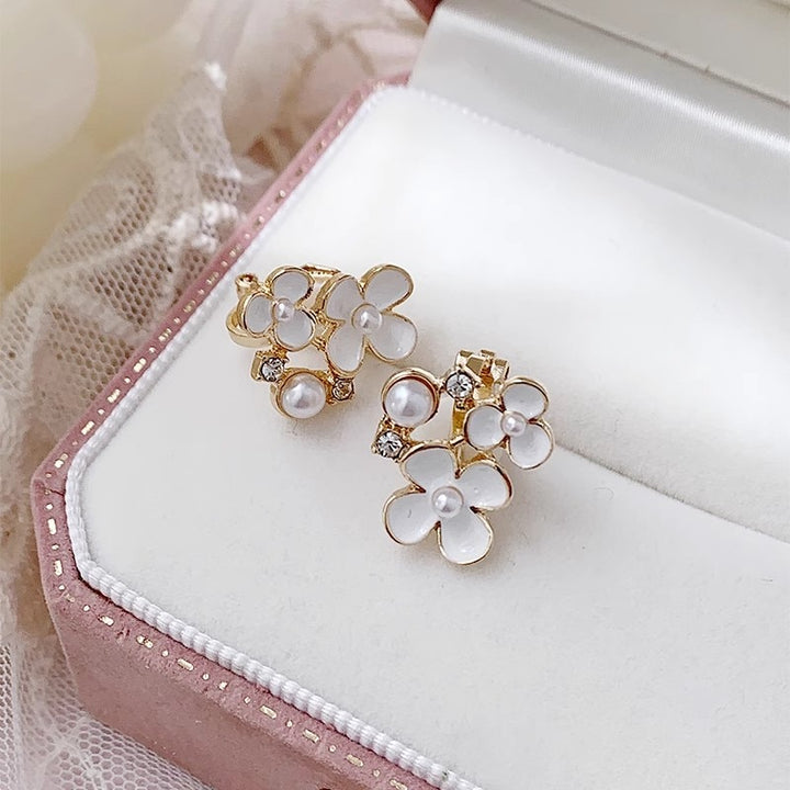 White Flower Clip on Earrings