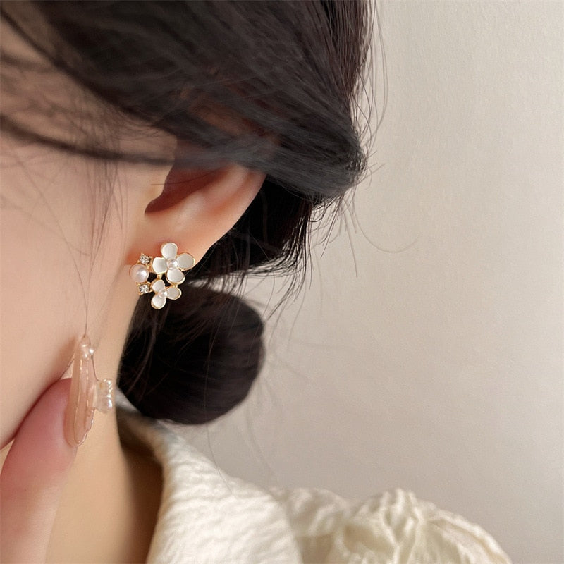 White Flower Clip on Earrings