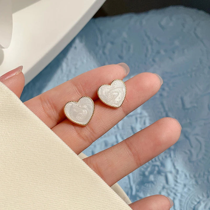 Tiny White Heart Clip on Earrings