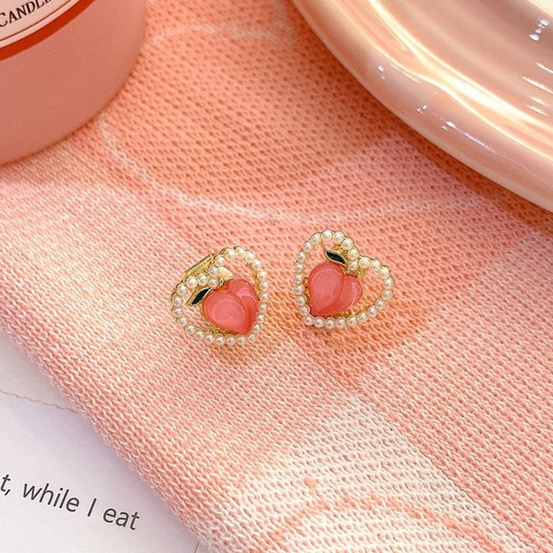 Tiny Peach Heart Pearl Clip on Earrings