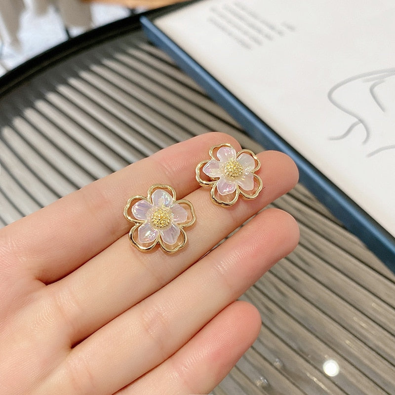 White Flower Clip on Earrings
