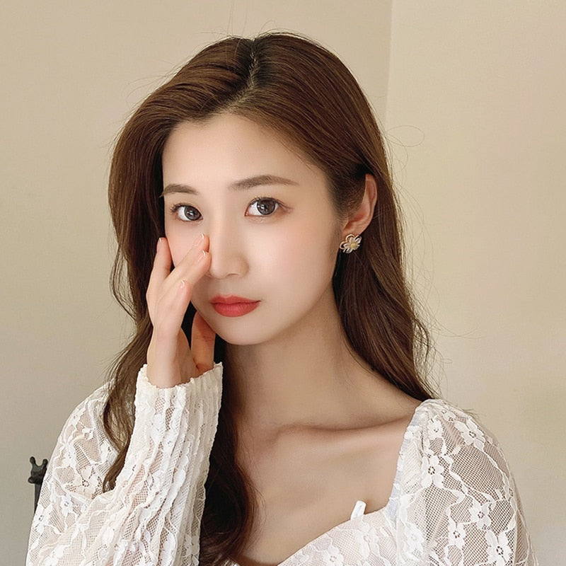 White Flower Clip on Earrings