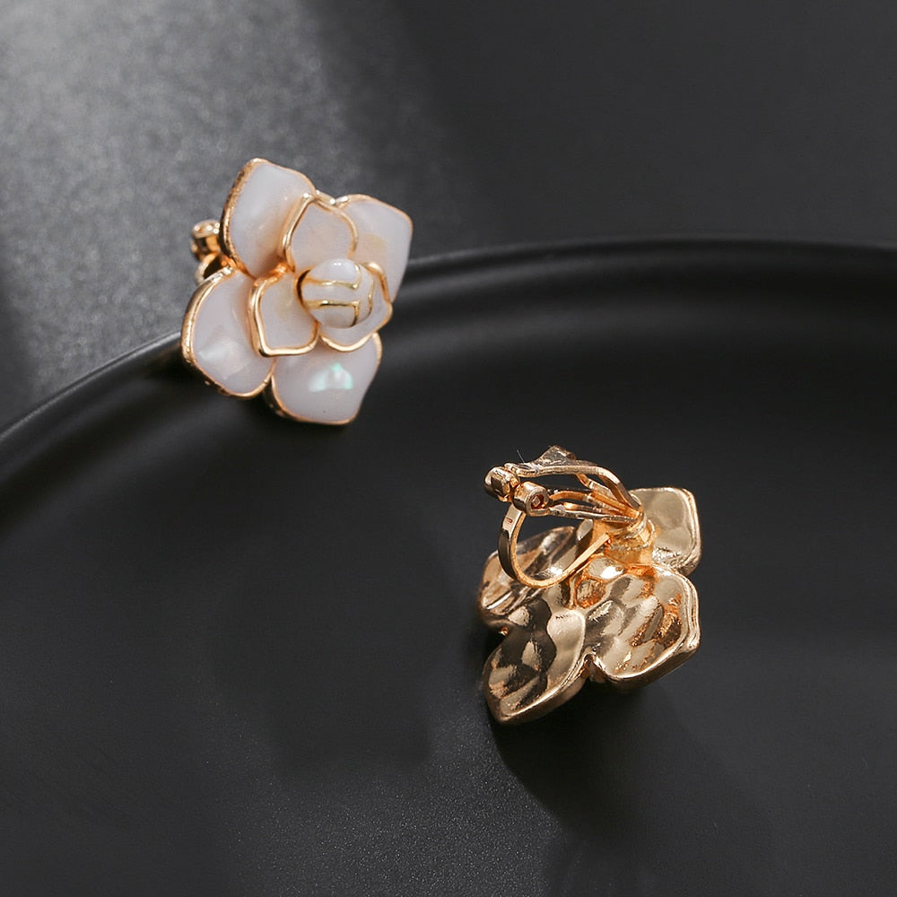 White Flower Clip on Earrings