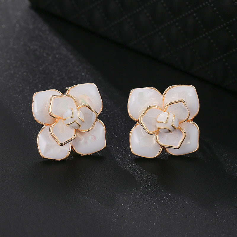 White Flower Clip on Earrings