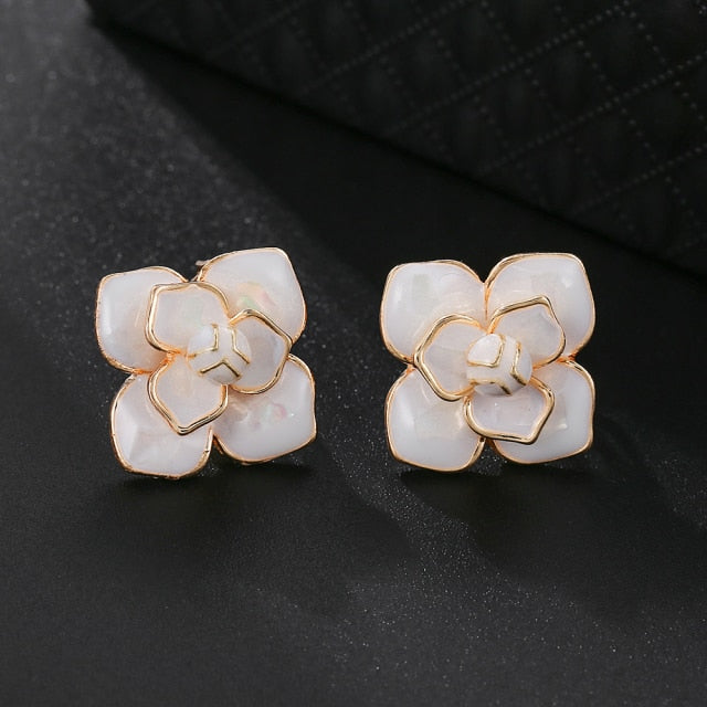 White Flower Clip on Earrings
