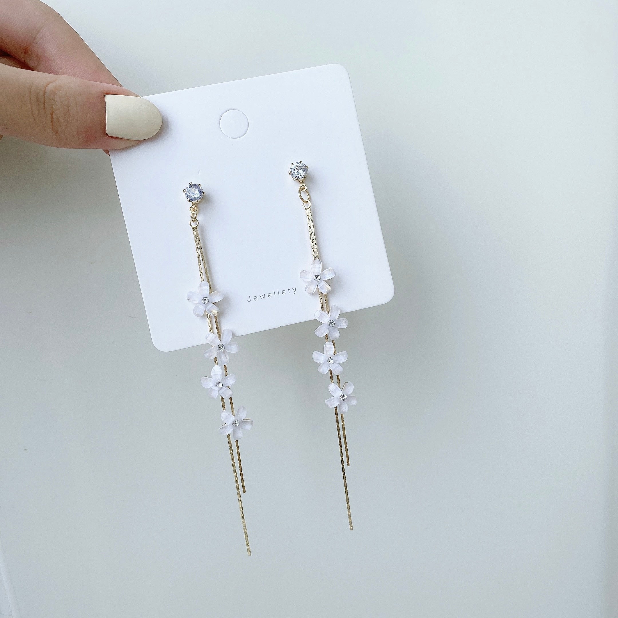 Long Tassel White Flower Clip on Earrings